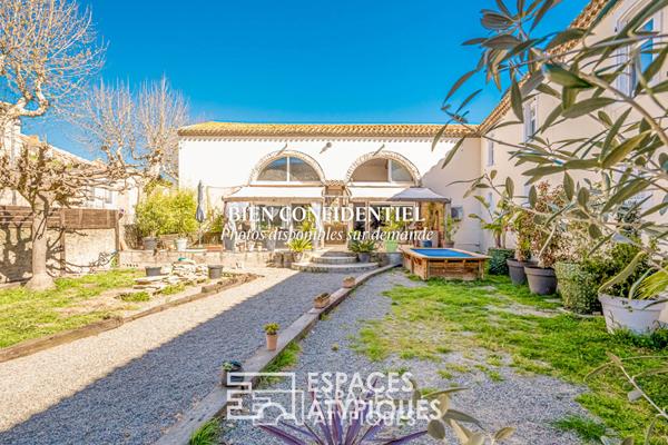 Ancienne cave viticole réhabilitée en loft avec jardin et garages