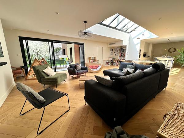 Loft en hyper centre avec sa terrasse et garage.