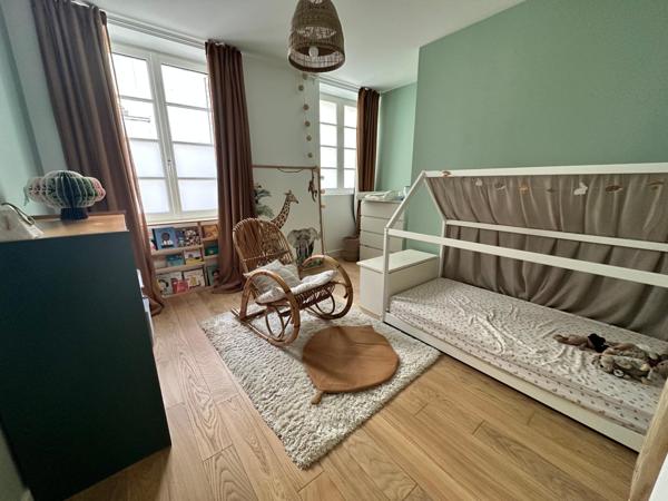 Loft en hyper centre avec sa terrasse et garage.