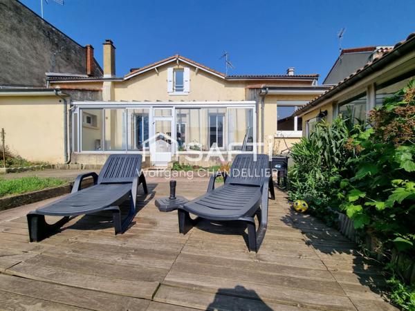 2 garages, panneaux photovoltaïques, véranda, etc...