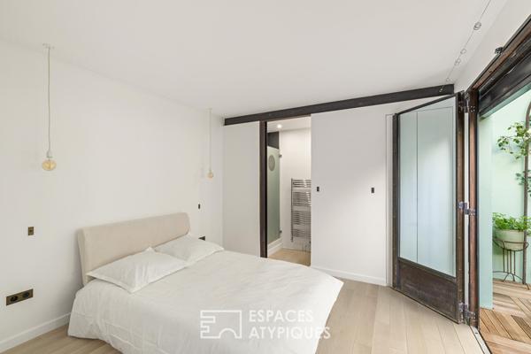 Ancien atelier réhabilité en maison d’architecte avec patio confidentiel