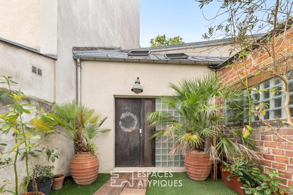 Ancien atelier réhabilité en maison d’architecte avec patio confidentiel