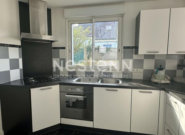 Plain pied, hyper centre ville de Questembert, 70 m² , jardin au calme
