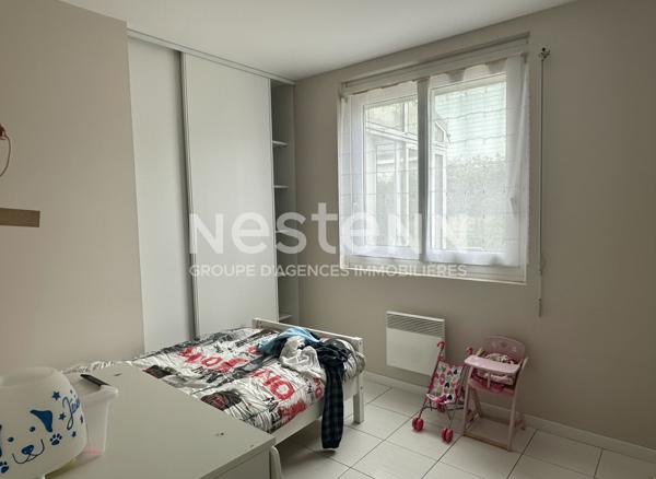 Plain pied, hyper centre ville de Questembert, 70 m² , jardin au calme