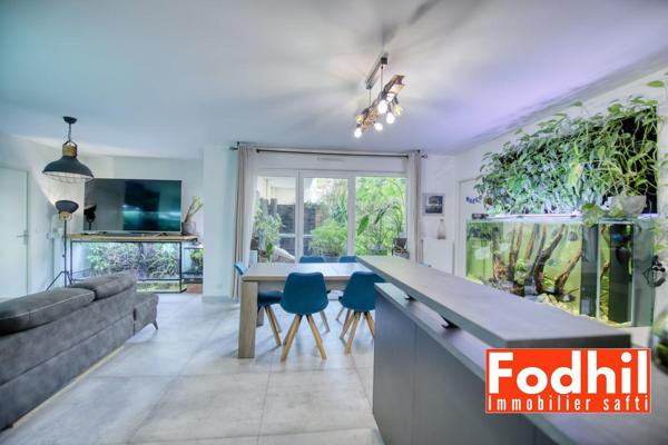 Appartement 4 pièces 82m² avec terrasse et jardin- Parking en sous-sol.