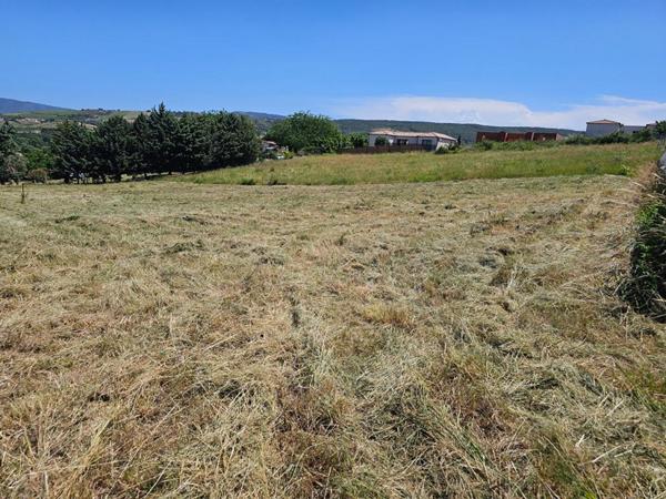 Terrain constructible de 5 201 m² avec vue dégagée , Projet de division en 4 lots
