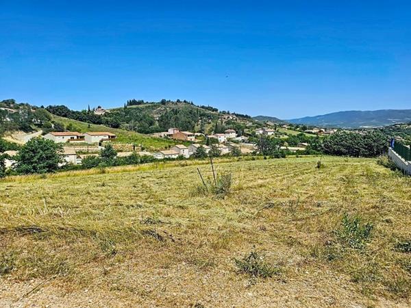Terrain constructible de 5 201 m² avec vue dégagée , Projet de division en 4 lots