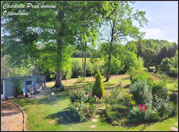 Maison avec vue et jardin arboré - 180m²