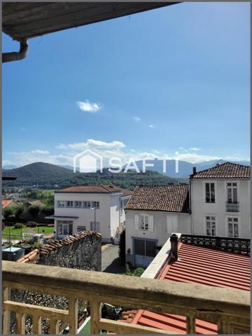 Immeuble à fort potentiel et local commercial avec studio.