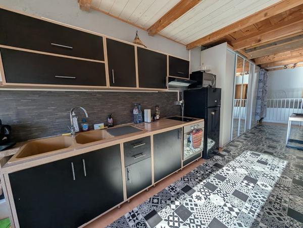 Immeuble 3 appartements + local commercial