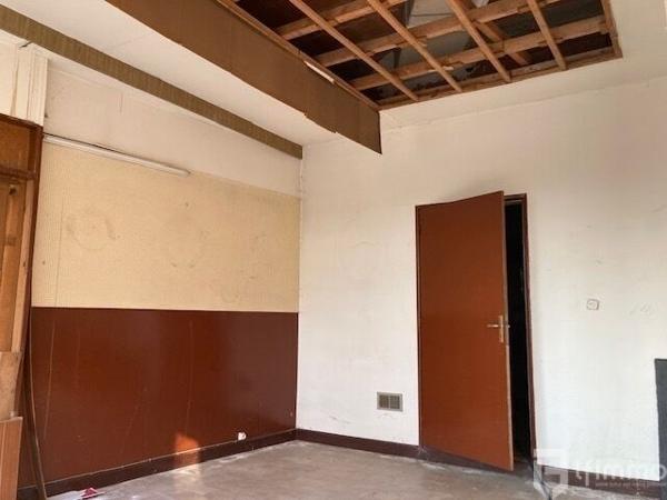 Ensemble immobilier : Un Local Commercial + Appartement Duplex.