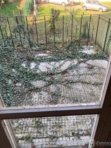 Ensemble immobilier : Un Local Commercial + Appartement Duplex.