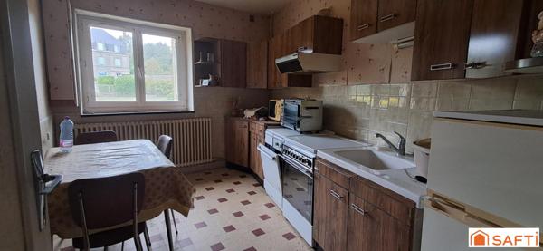 maison en pierres 3ch terrain et 6 garages loués