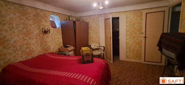 maison en pierres 3ch terrain et 6 garages loués