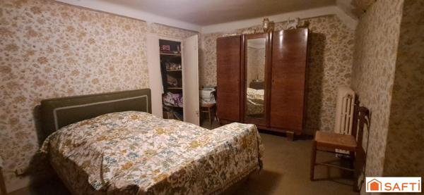 maison en pierres 3ch terrain et 6 garages loués