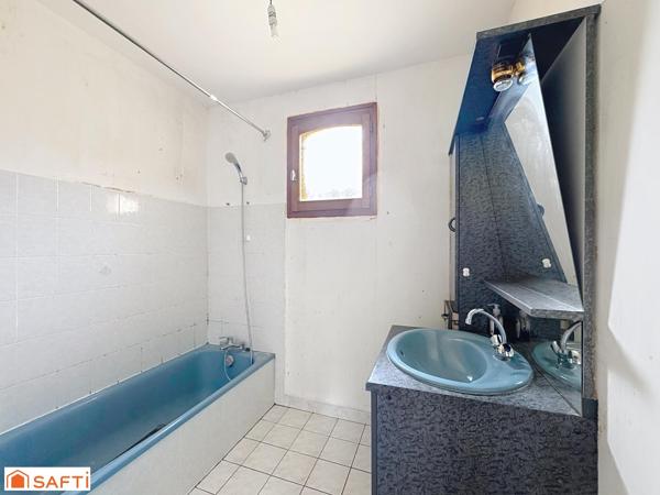 Maison de plain-pied – 3 chambres – Double garage – Environnement calme