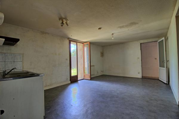 IMMEUBLE DE RAPPORT AVEC 2 APPARTEMENTS ET UNE MAISON