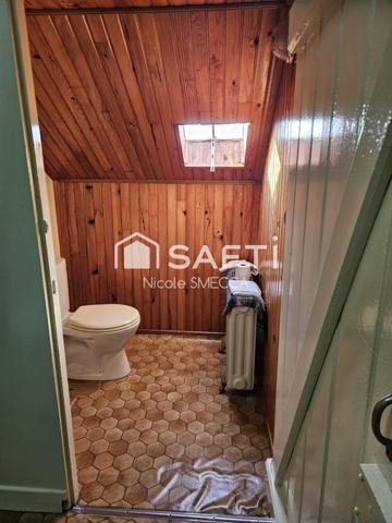 Maison mitoyenne 6 chambres,jardin,garage