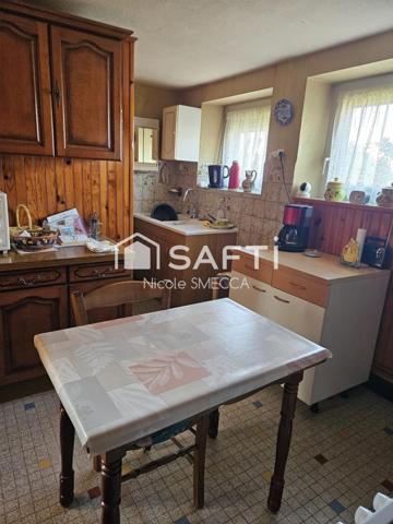 Maison mitoyenne 6 chambres,jardin,garage