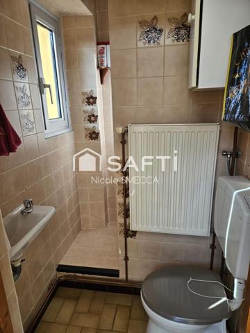 Maison mitoyenne 6 chambres,jardin,garage