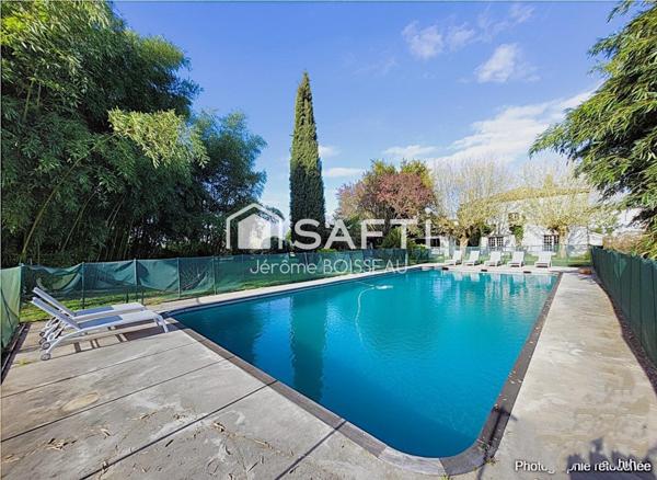 Maison d'exception aux vastes pièces  dans un écrin de verdure