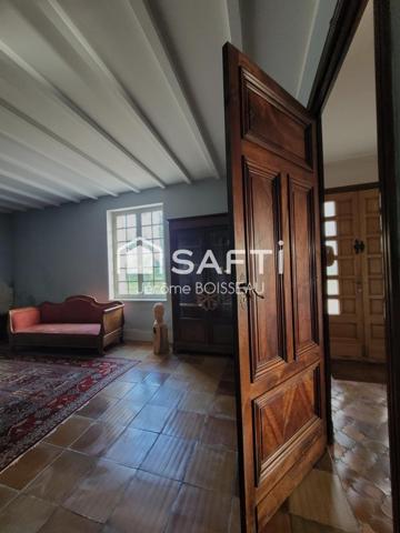 Maison d'exception aux vastes pièces  dans un écrin de verdure