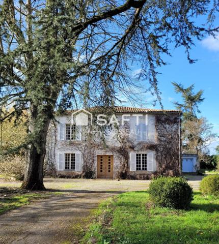 Maison d'exception aux vastes pièces  dans un écrin de verdure