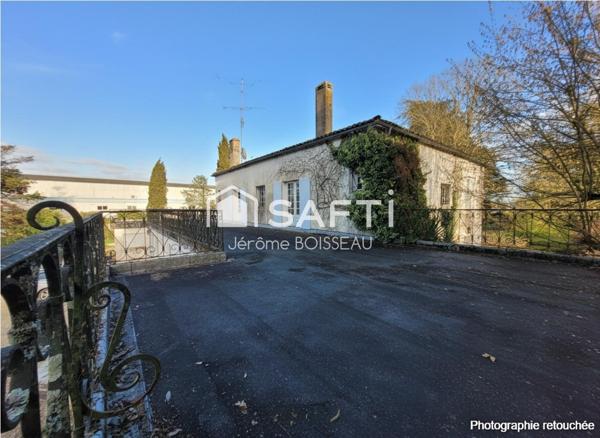 Maison d'exception aux vastes pièces  dans un écrin de verdure