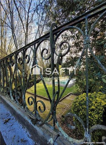 Maison d'exception aux vastes pièces  dans un écrin de verdure