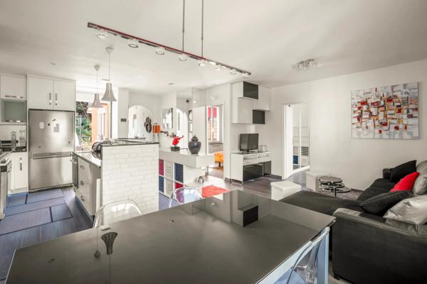 Appartement de 80m2, 2 chambres, 2 places de parking à FONTAINES SUR SAONE (69)