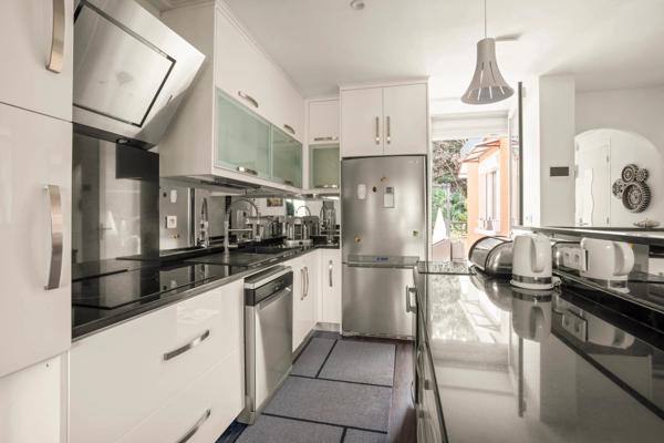 Appartement de 80m2, 2 chambres, 2 places de parking à FONTAINES SUR SAONE (69)