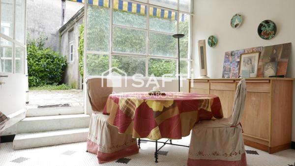 Immeuble en pierre de 174 m2 à rénover avec dépendance,  jardin et garage de 140 m2