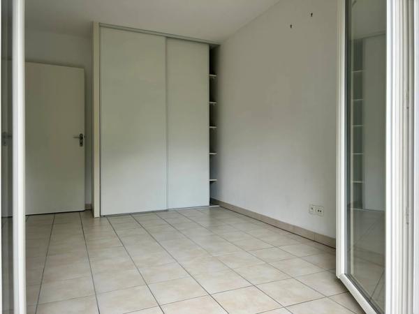 Acheter un Appartement 85m2 de type 4/T4 Merignac quartier Arlac proche CHU Pellegrin 3 chambres Rez de Jardin Balcon et terrasse sur tout l'appartement 2 parking 1 cellier