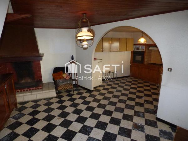 Maison, proche du centre ville, terrain de loisir