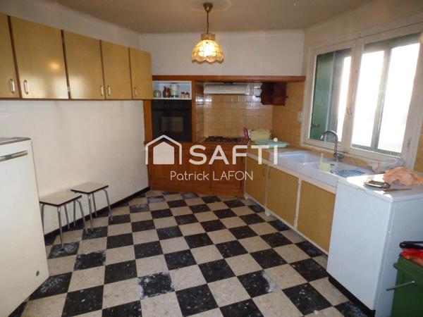 Maison, proche du centre ville, terrain de loisir