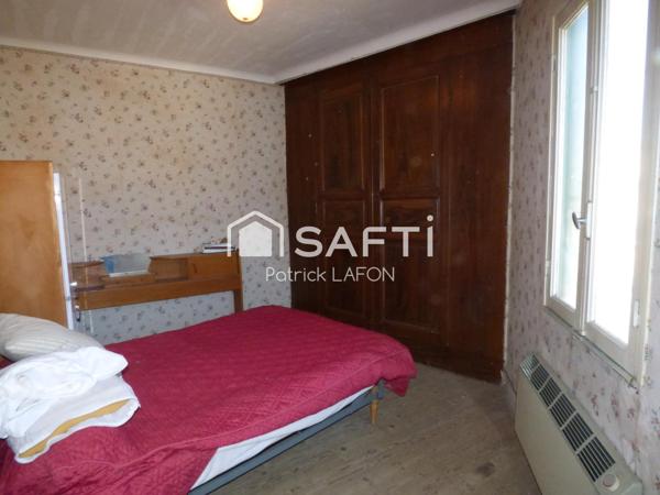 Maison, proche du centre ville, terrain de loisir