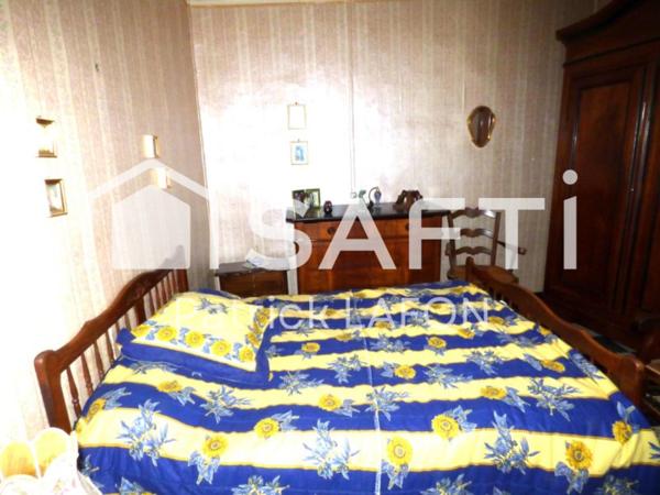 Maison, proche du centre ville, terrain de loisir