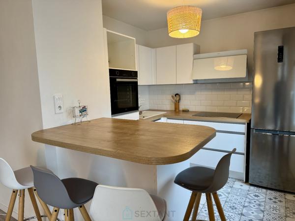 Duplex moderne avec terrasse et parkings