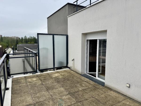 Duplex moderne avec terrasse et parkings