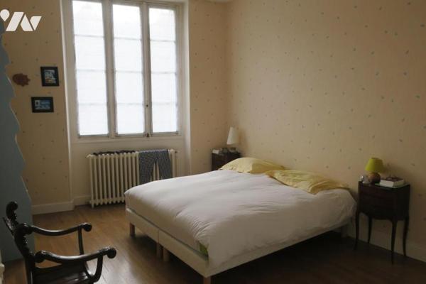 Immeuble de rapport - 3 appartements (2 occupés + 1 libre) - Garage - Caves - Cour. 263 m² cadastré.