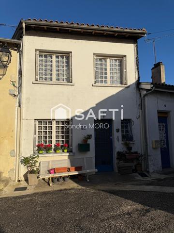 Maison de ville avec locataire en place – idéal investissement