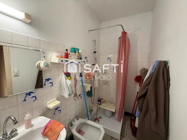 Maison de ville avec locataire en place – idéal investissement