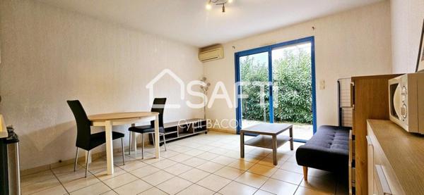 Appartement une pièce 24 m2 avec terrasse, parking, et cave