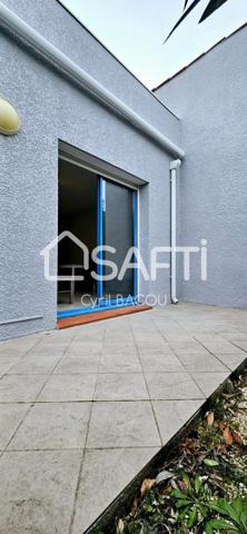 Appartement une pièce 24 m2 avec terrasse, parking, et cave