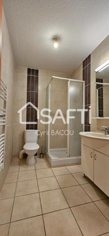 Appartement une pièce 24 m2 avec terrasse, parking, et cave