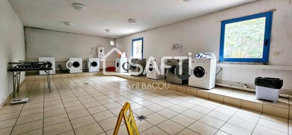 Appartement une pièce 24 m2 avec terrasse, parking, et cave