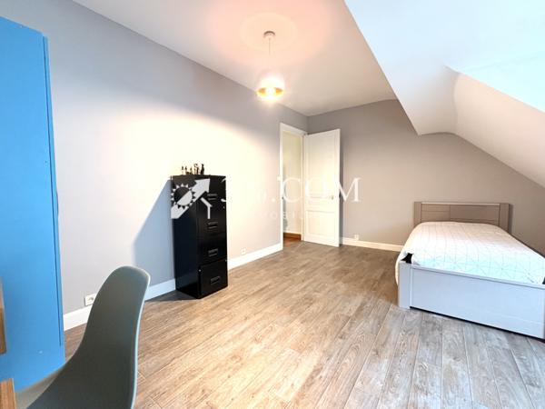 Maison 7 pièce(s) 4 chambre(s) 107 m²