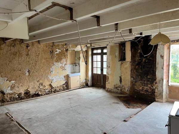 Maison avec terrain non attenant et grange