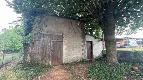 Maison avec terrain non attenant et grange