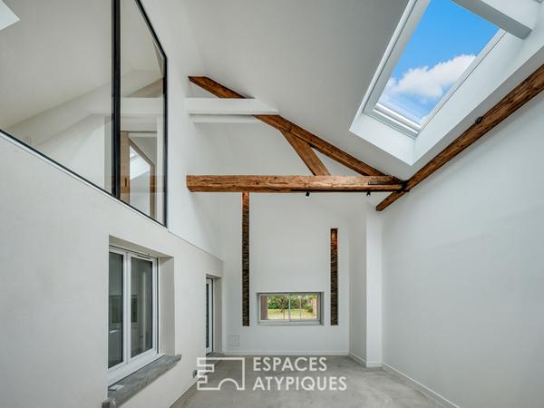 La maison meulière à la rénovation contemporaine avec atelier et jardin